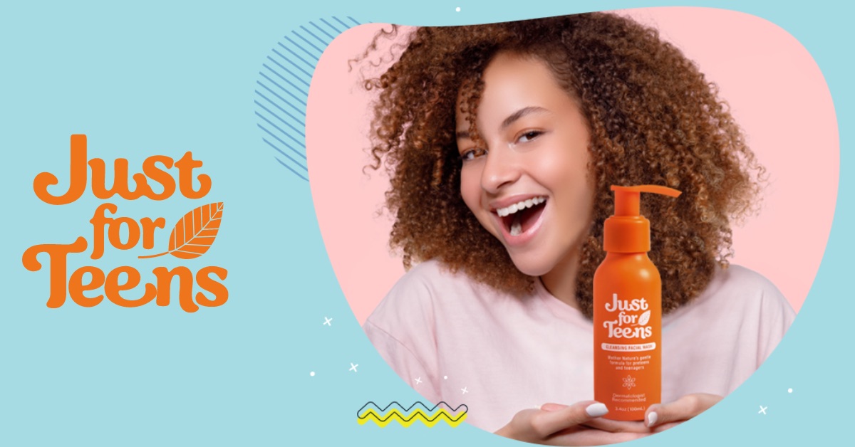 Just For Teens cleansing facial wash held by a smiling teenager